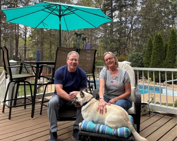 Gordy and wife, Tara, with family dog