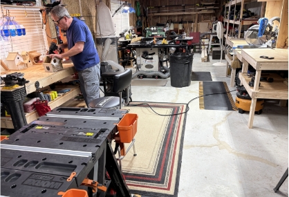 Gordy doing woodworking at home
