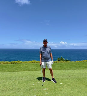 Rope playing golf at Makai Golf Club in Princeville, Kauai.
